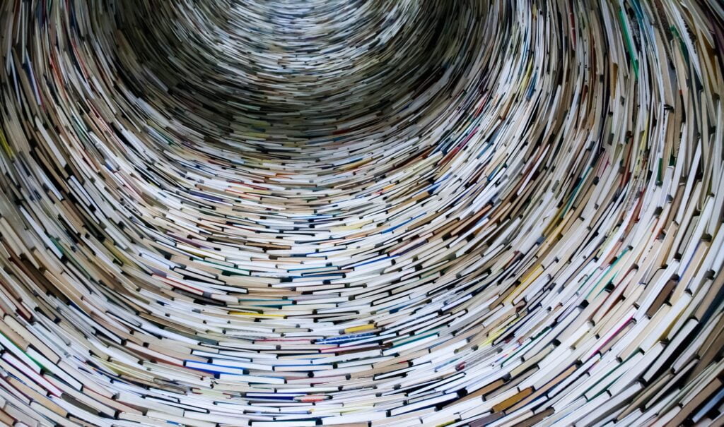 5 Free Digitally Advanced Citation Tools For Your Next Research Paper 2 Low angle view of tower books as representation of citation sources for your next research project