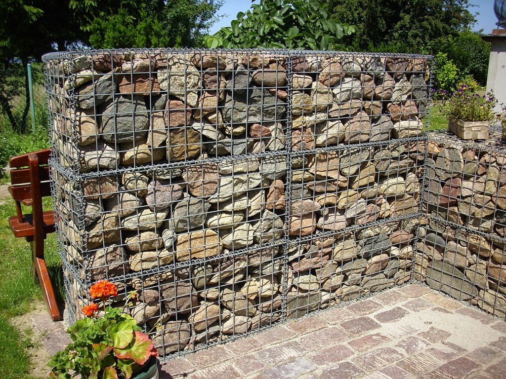 Choosing The Best Garden Fence Panel: A Comprehensive Guide 7 wire cages filled with stones