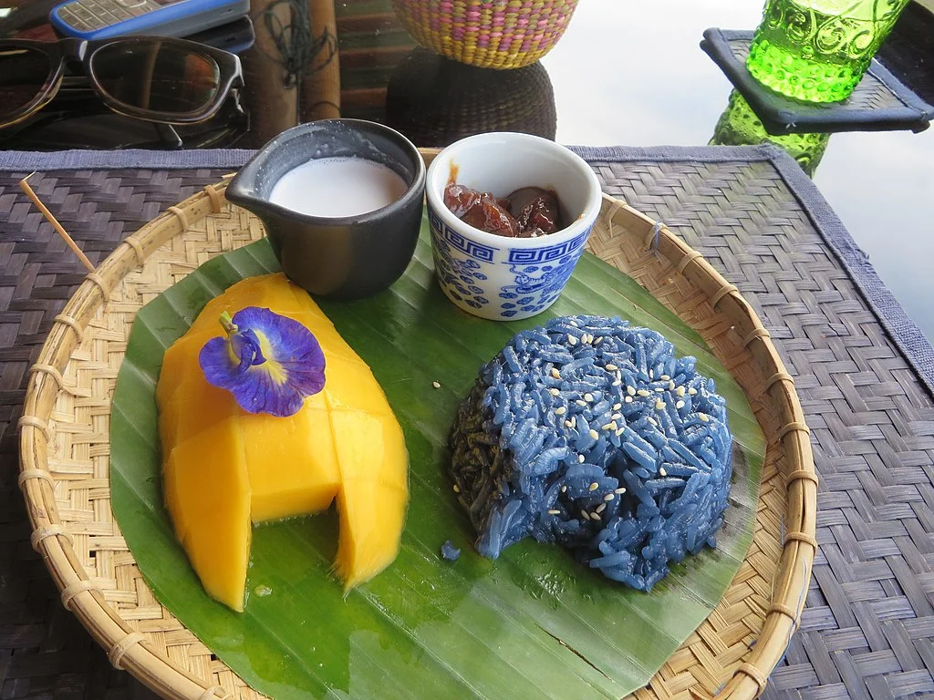 What Is A Blue Butterfly Pea Flower: Characteristics, Usage, And Cultivation 5 Clitoria ternatea, Laos, the flowers are used to dye rice blue.