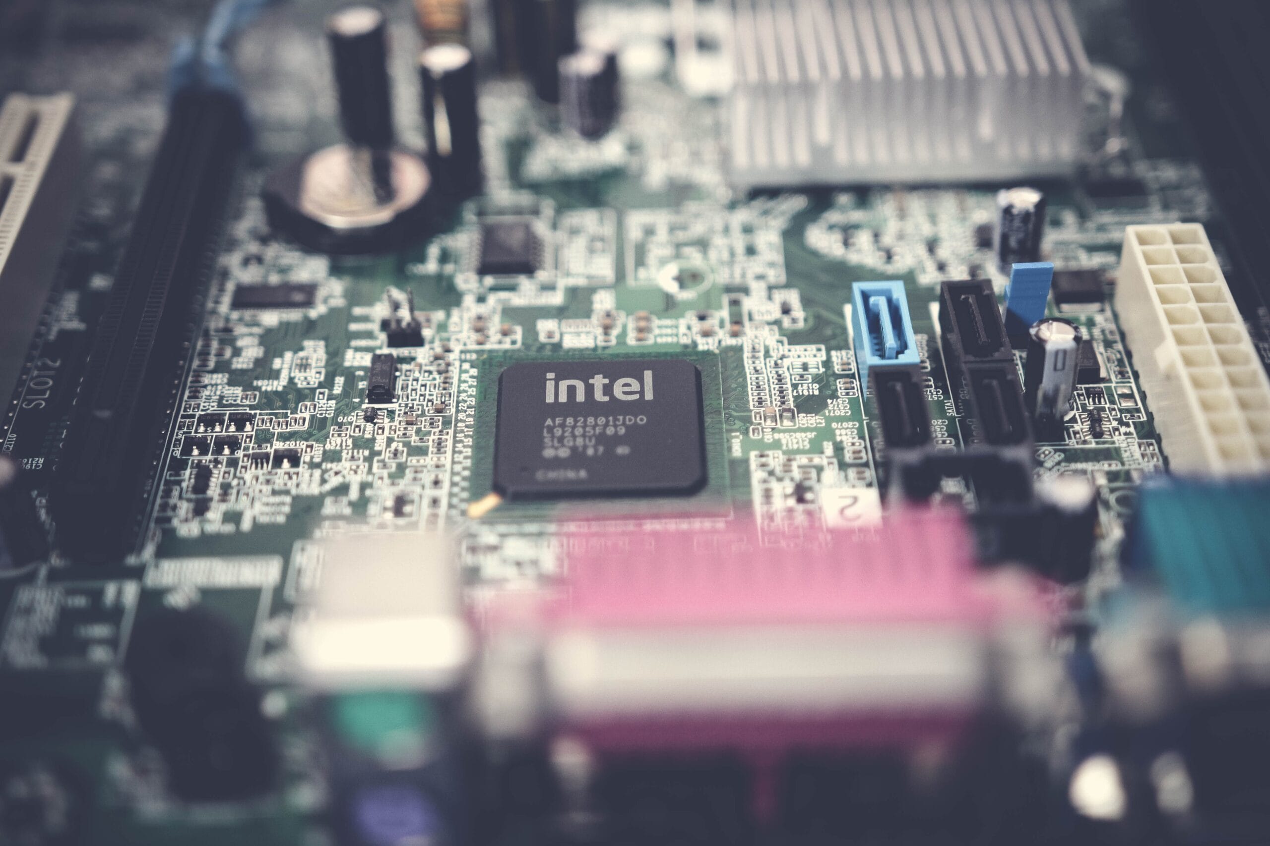 futuristic data center with glowing AI servers and Intel branding
