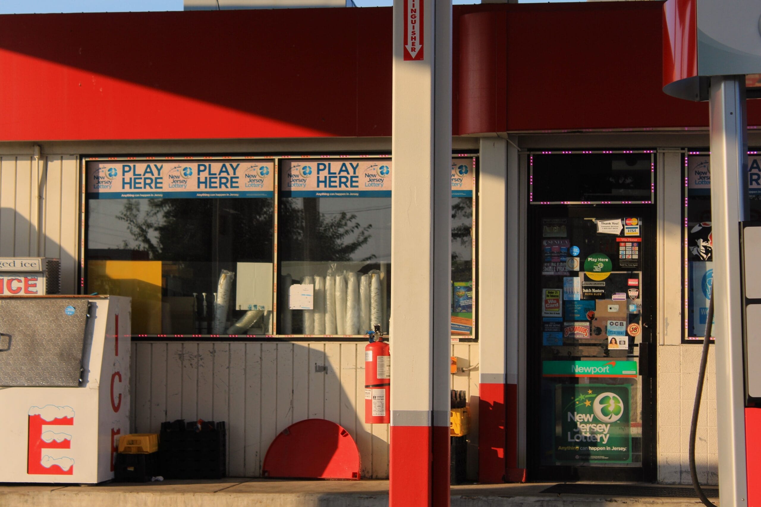 NJ Lottery Payouts: Real Money or Hype for Side Hustlers? 3 Close‑up of a Powerball ticket with numbers highlighted against a backdrop of New Jersey skyline