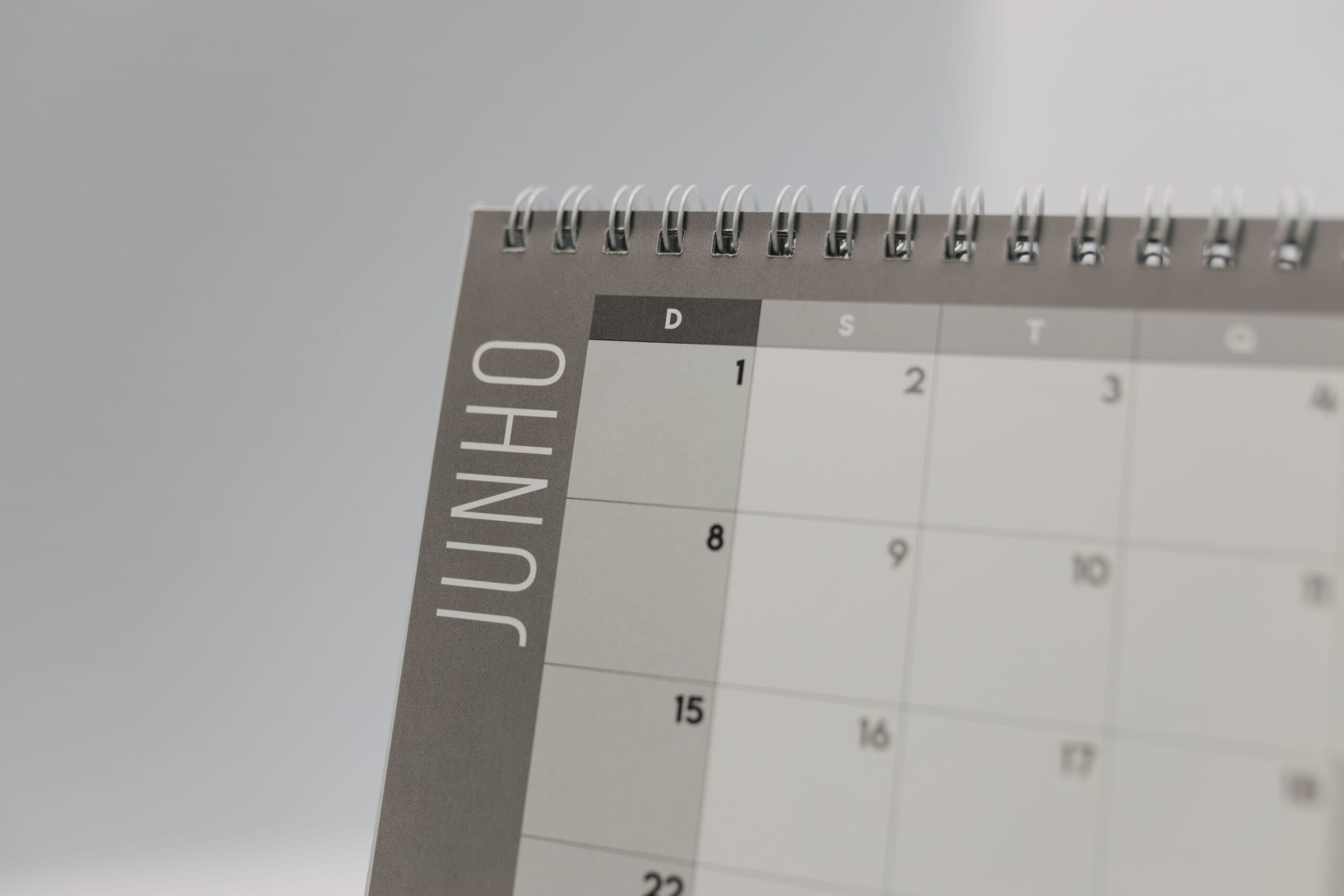 investor reviewing dividend payout calendar on a tablet with a garden background