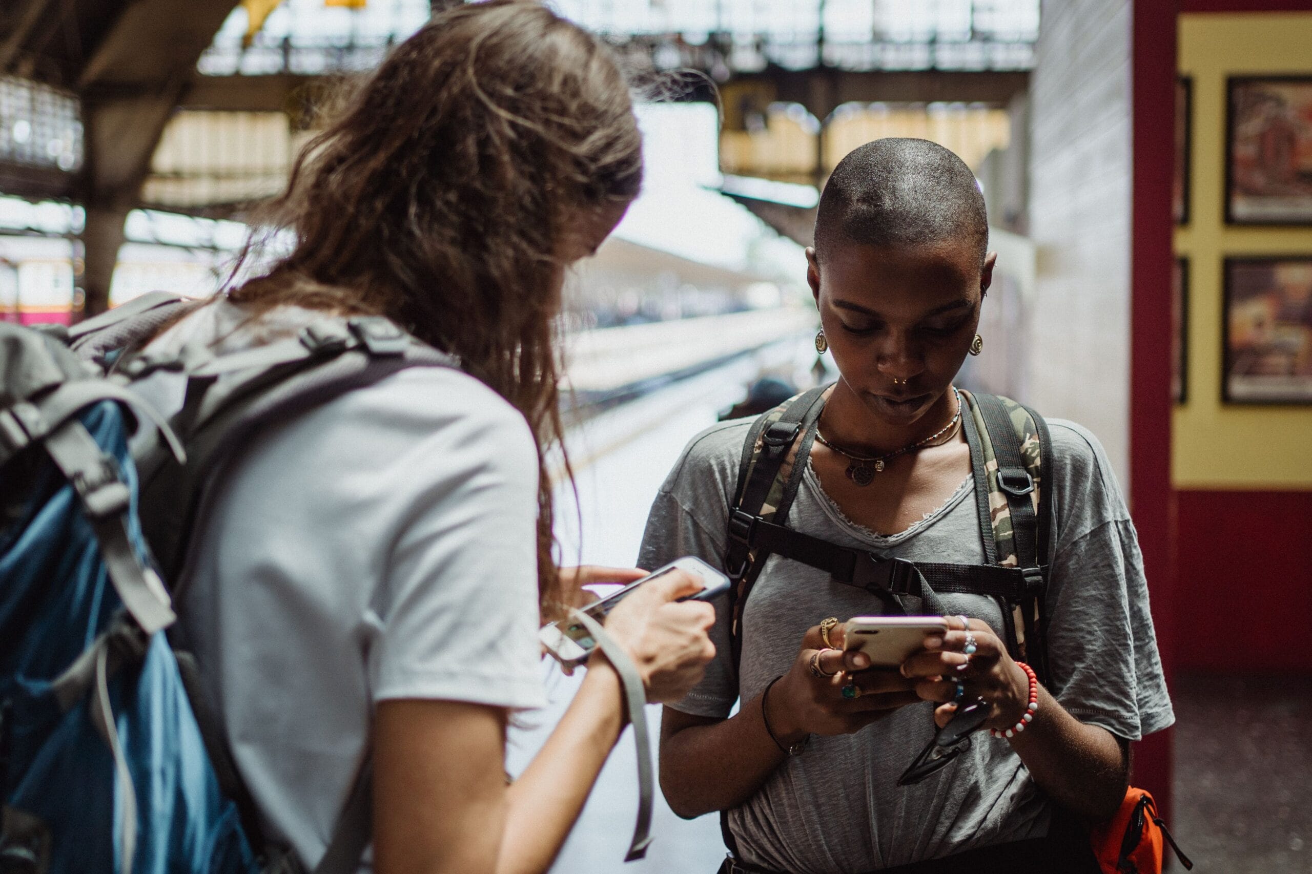 Online surveys that pay: A Practical Guide 3 Person filling out a survey on a tablet while traveling on a train