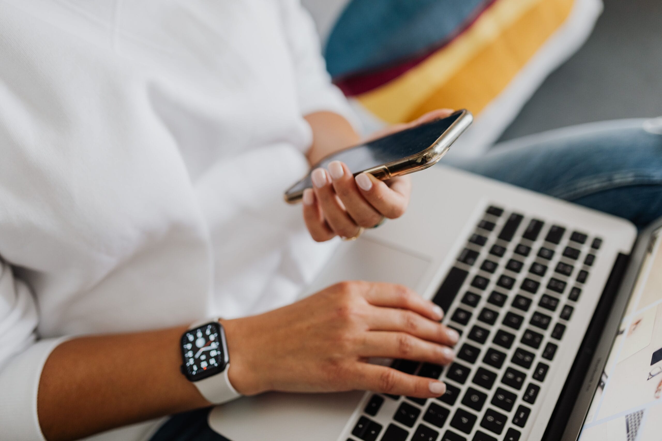 Quick Cash Survey Sites With Same-Day PayPal Payouts in 2026 3 a person checking a laptop and phone with survey notifications