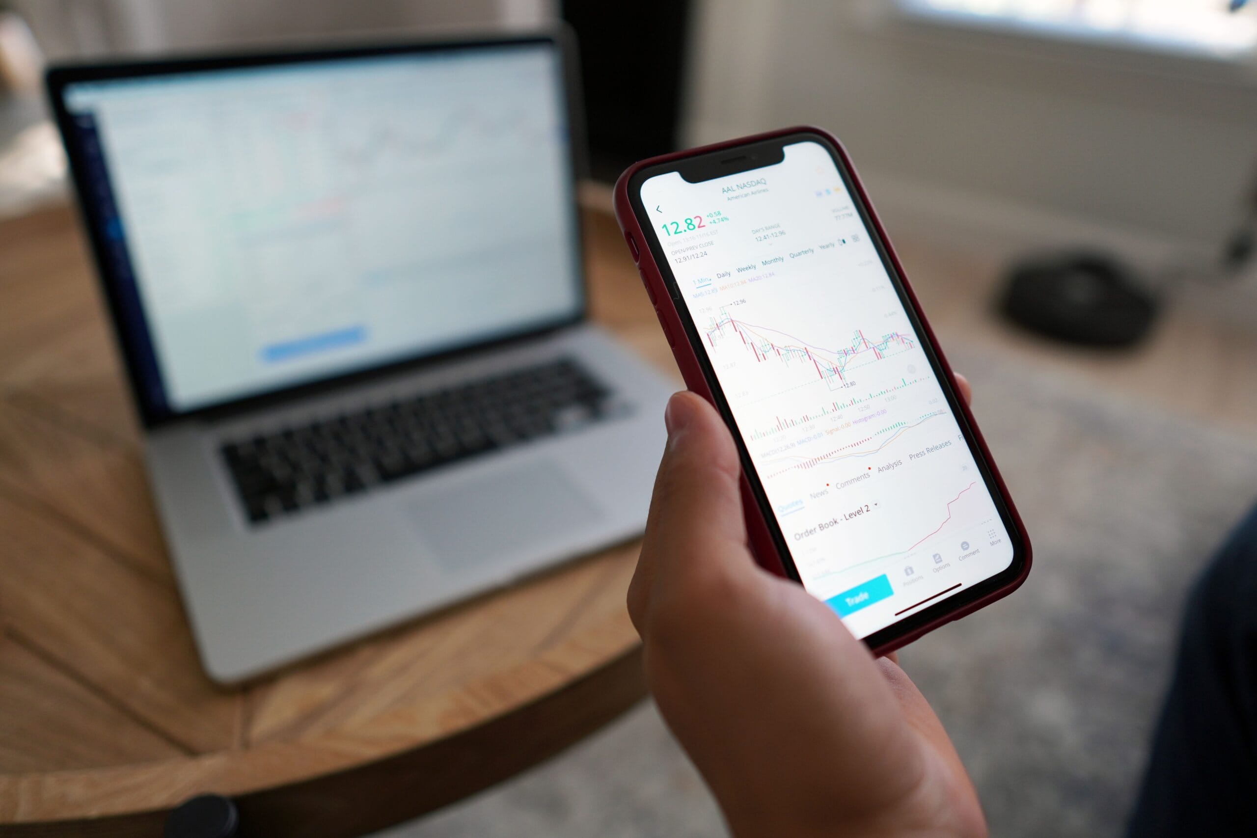 Is Nintendo Stock a Safe Bet for Side Hustlers? 6 Smartphone displaying a brokerage app with fractional share purchase screen