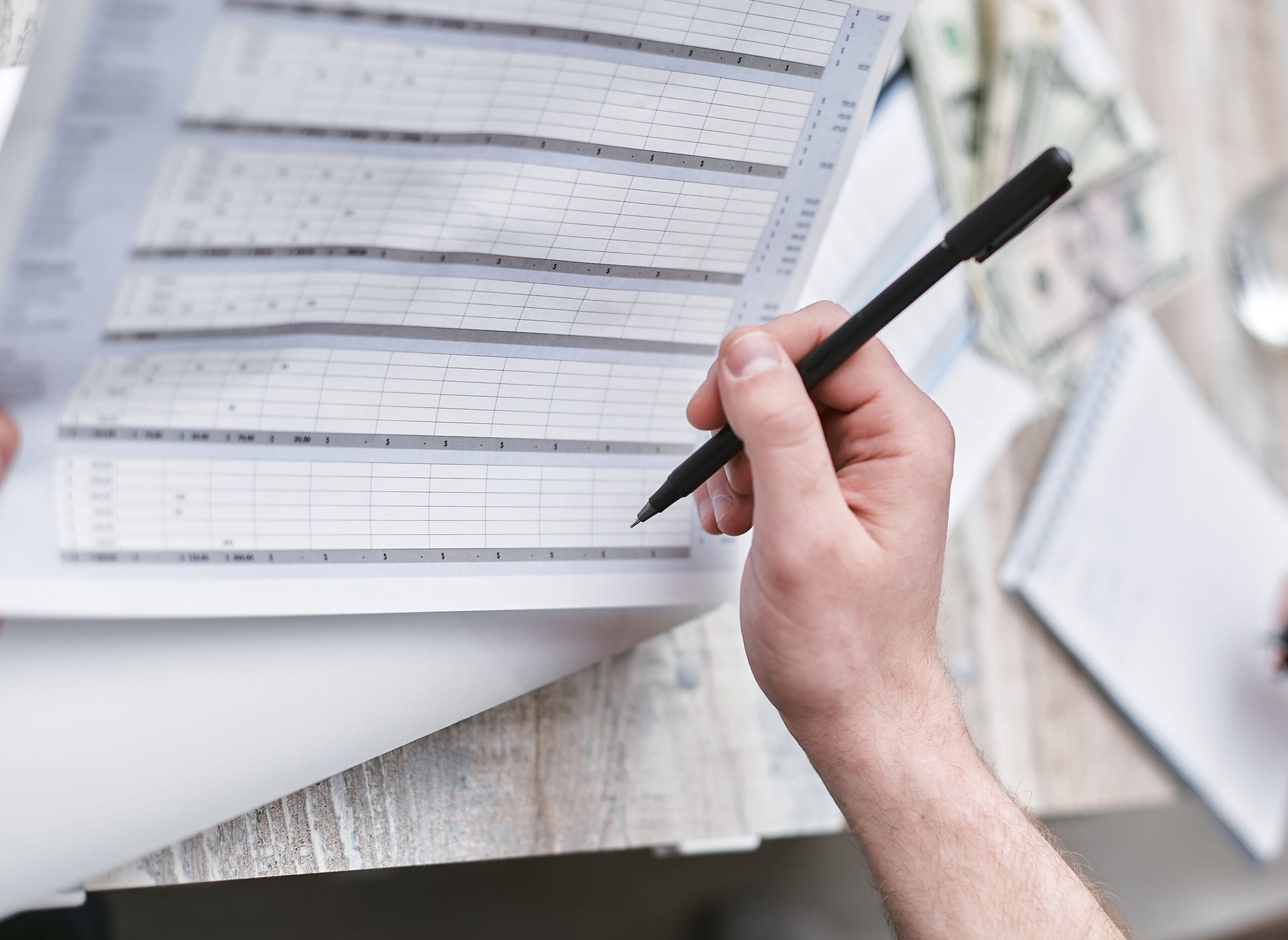 Wendy's Rewards: Can You Actually Turn Free Food into Cash? 5 A notebook with a spreadsheet tracking Wendy's points, cash back, and savings