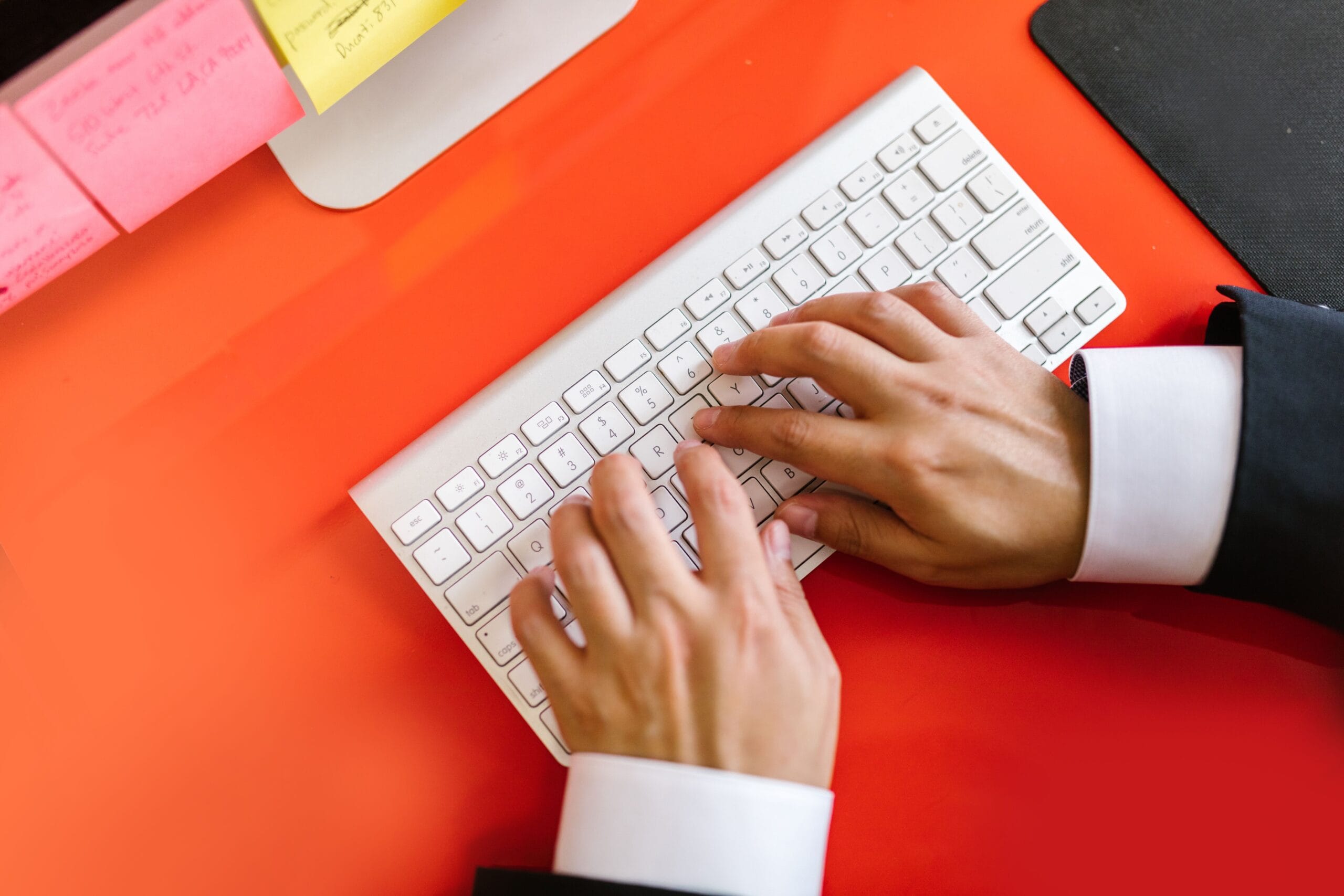 Legit Data Entry Side Hustles With Daily Payouts 5 Hands typing rapidly on a mechanical keyboard with a speed‑test app displayed on screen