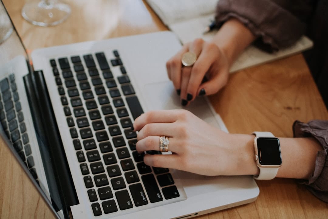 Gig Economy Side Hustles That Pay Daily or Fast in 2026 5 Person using a laptop to complete online surveys with a coffee mug beside them