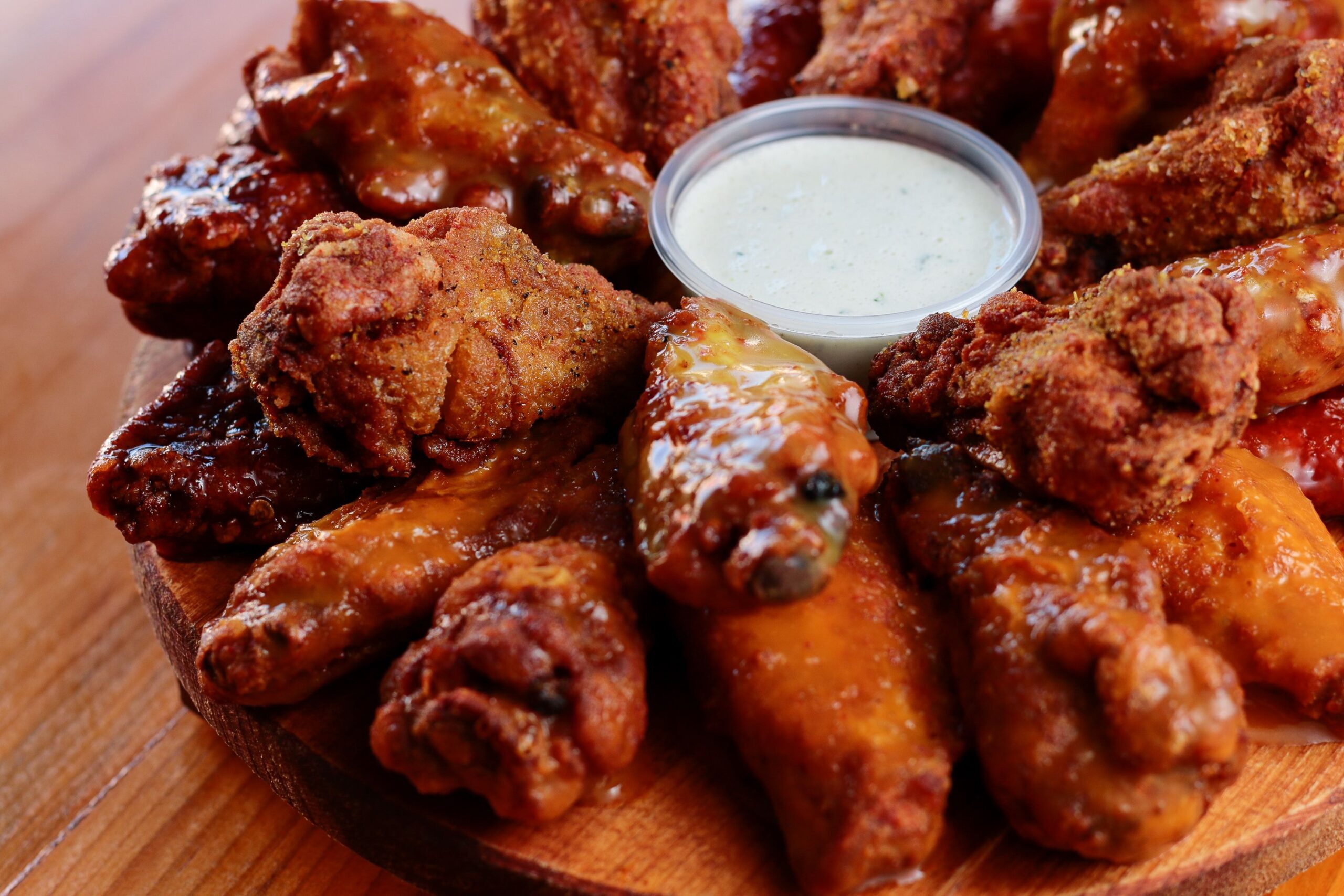 A spread of easy‑to‑make game day appetizers like nachos, wings, and sliders