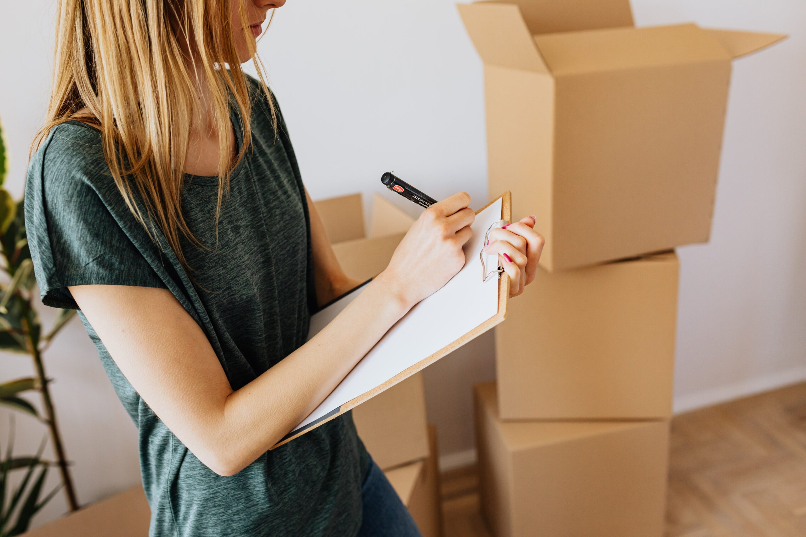 A checklist of permits, insurance, and payment methods laid out on a kitchen counter