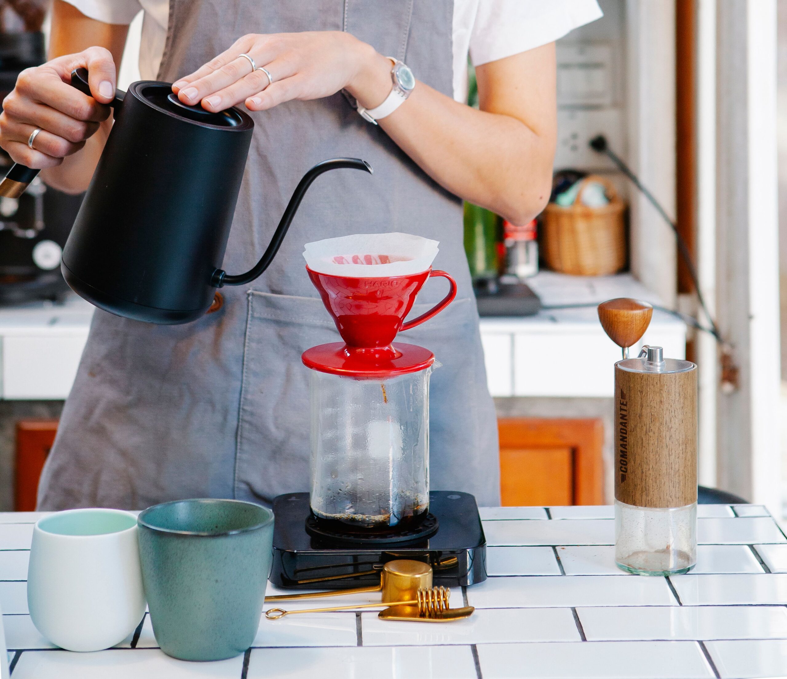 Beer Tips: What You Need to Know 3 stainless steel homebrewing kettle system setup in home kitchen
