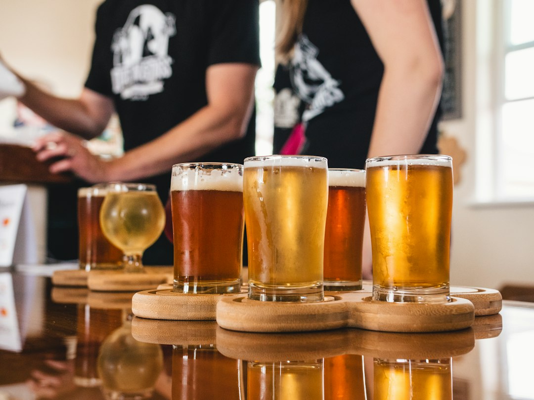 Affiliate Marketing for Craft Breweries: A Guide to Earning Commissions 2 close‑up of craft beer bottles with affiliate tracking screen
